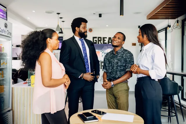 Group of professionals having a casual meeting in an office setting in Lagos. Prospecting software contracts: twelve questions before you sign